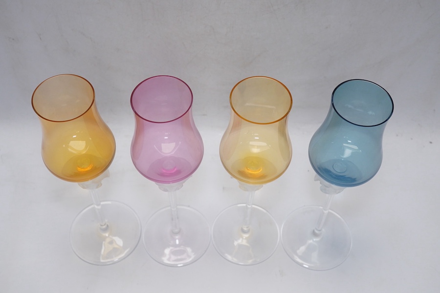 Four boxed Rosenthal for Versace Medusa head grappa glasses in various colours, 21.5cm high. Condition - good.